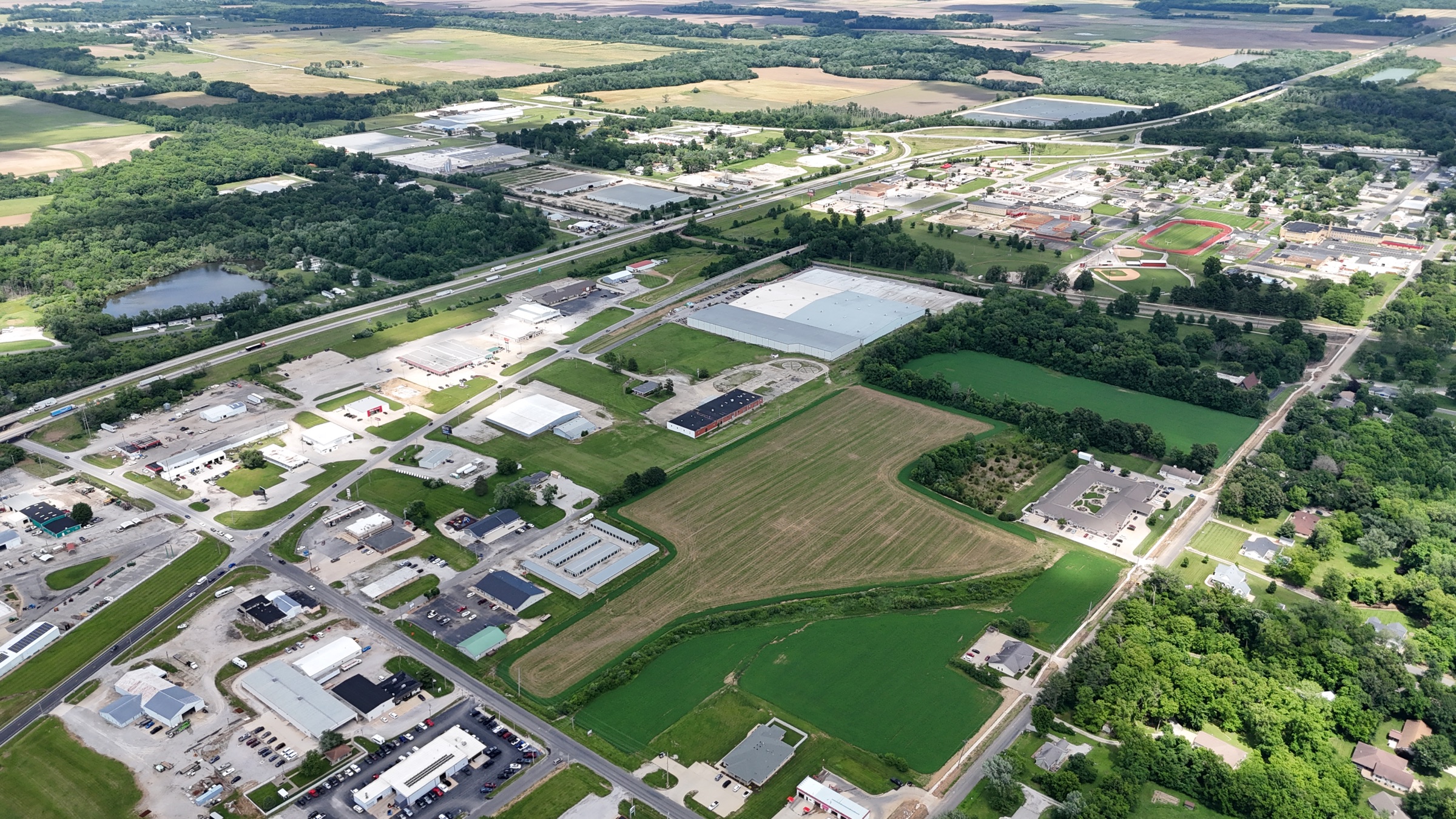 Aerial view of Vandalia’s interstate access, commercial district, industry, and school campus